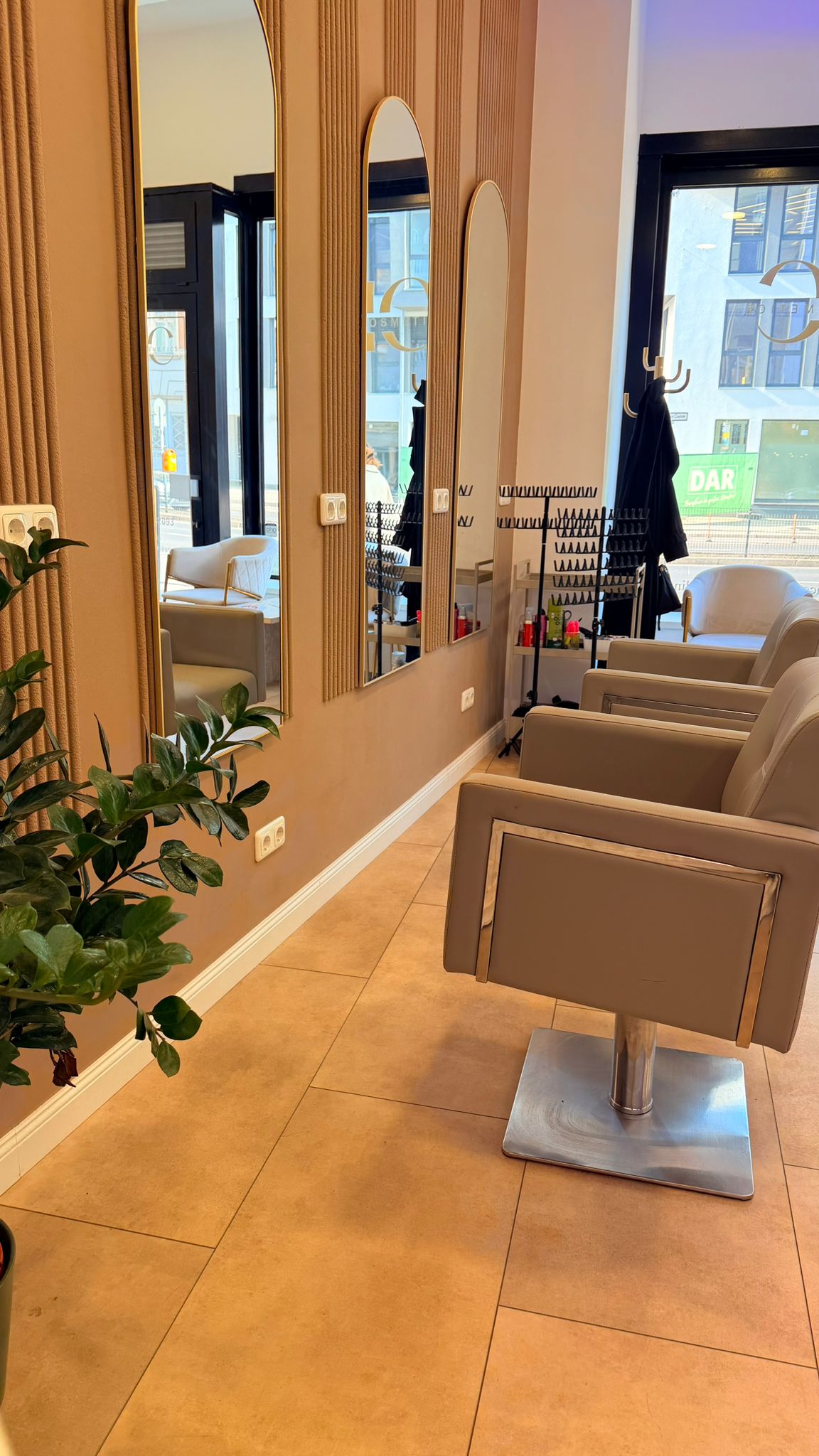 Candle-lit beauty station detail at Myzila Cosmetics